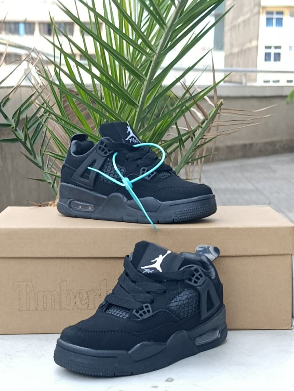Kids Jordan 4 sneakers -all black sneakers