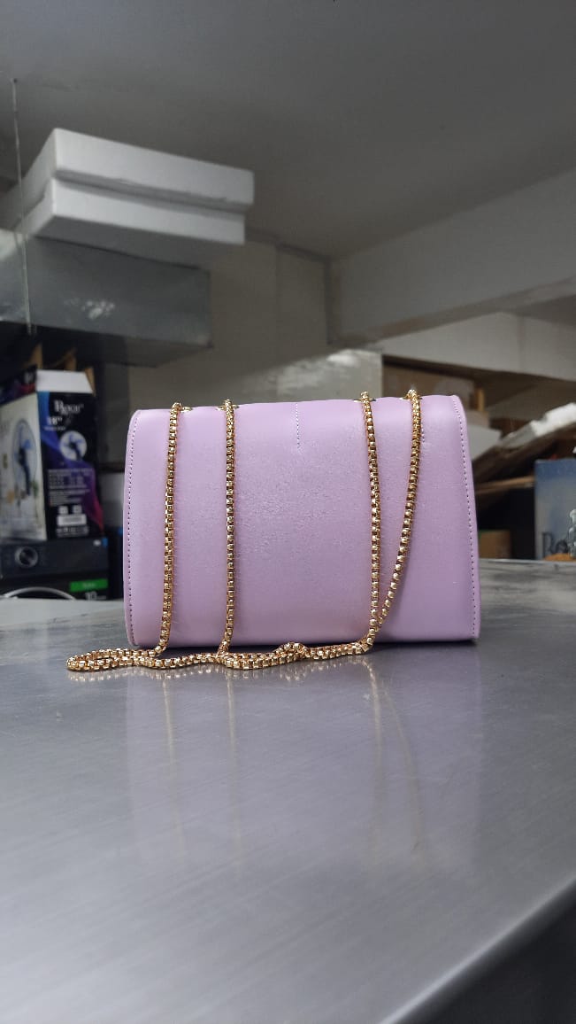 The Quilted Heart Charm Flap Bag