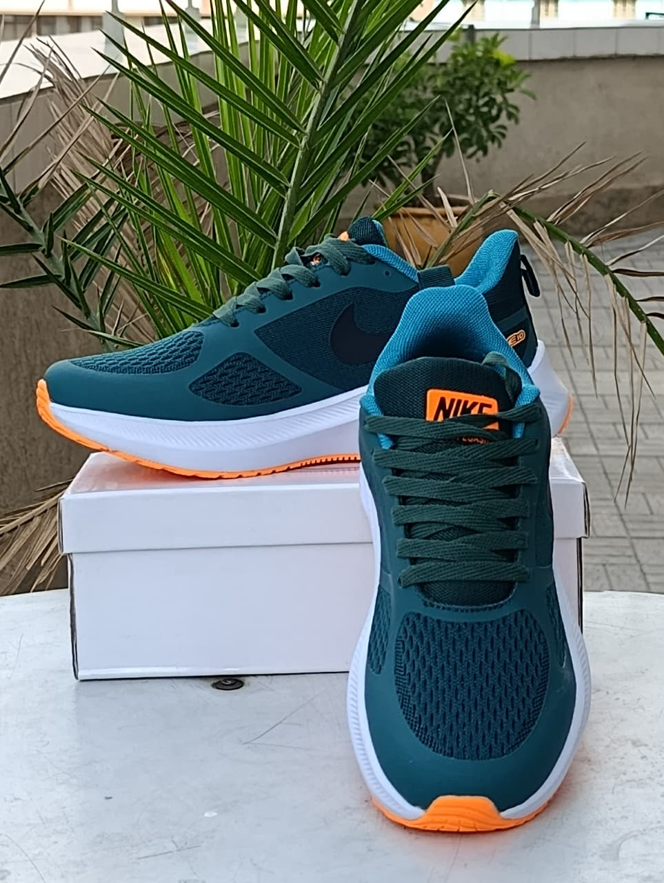 Nike Pegasus-Teal Blue and Orange Accents