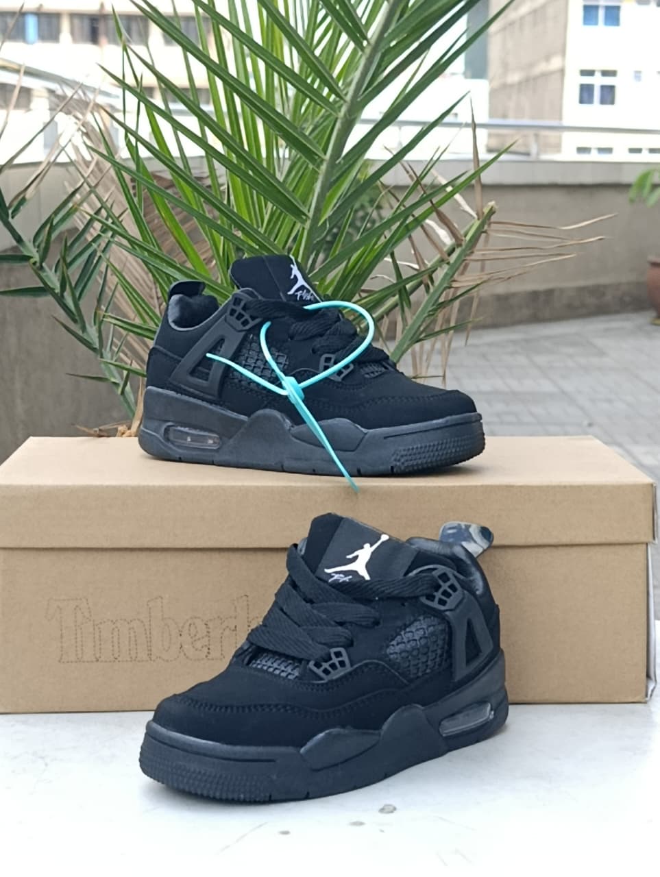 Kids Jordan 4 sneakers -all black sneakers