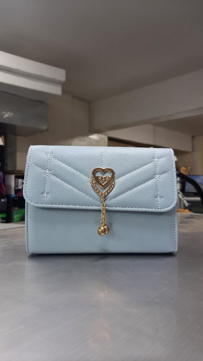 The Quilted Heart Charm Flap Bag