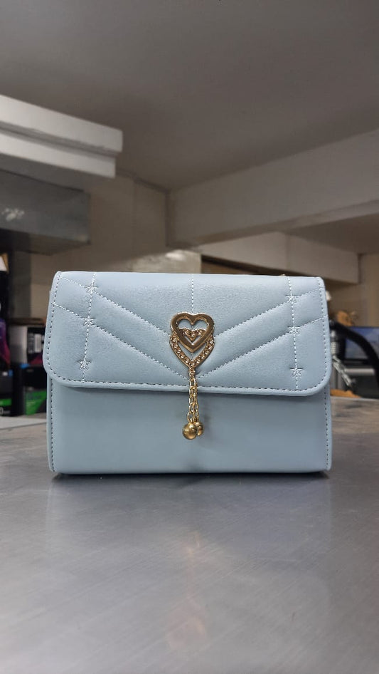 The Quilted Heart Charm Flap Bag