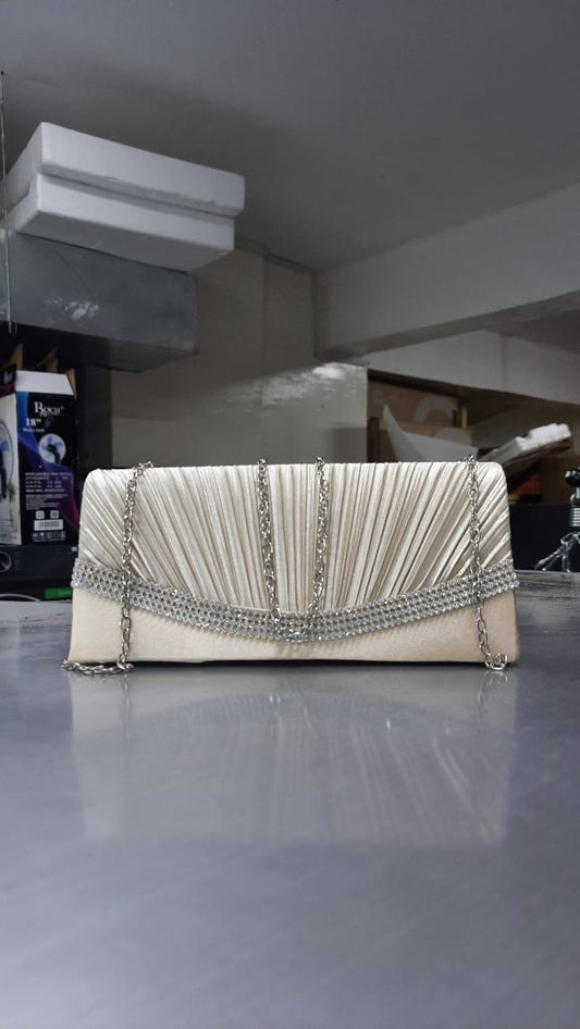 The Starlight Pleated Satin Rhinestone Clutch